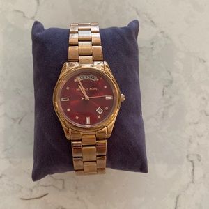 Rose gold Michael Kors watch with dark red face- 28mm